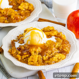 Caramel apple dump cake on a white plate